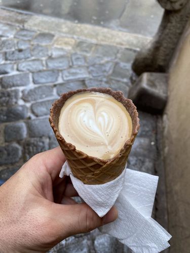 A cappuccino served in a waffle cone