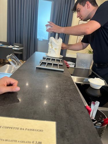 Scooping the gelato fresh.