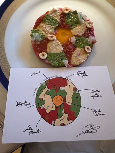 Their steak tartare, with postcard where the chef initially created the idea.