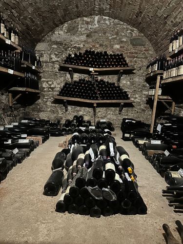 Wines being aged in a room that used to be a jail cell.