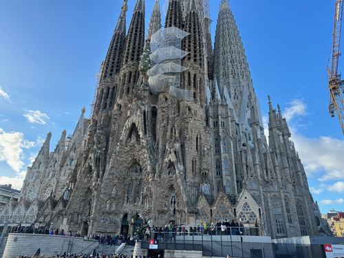 The towers of La Sagrada Familia from the street